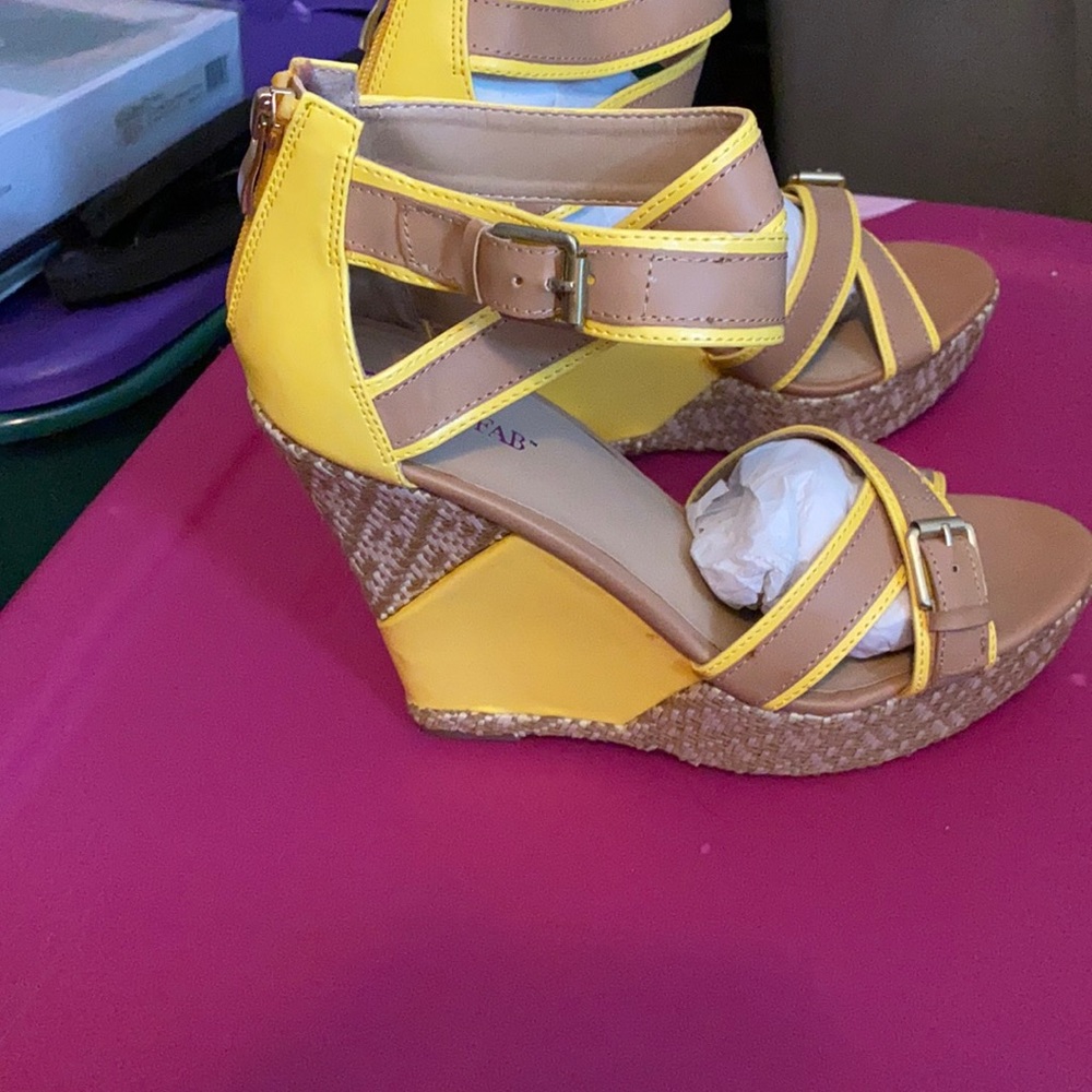 Yellow and tan sandals